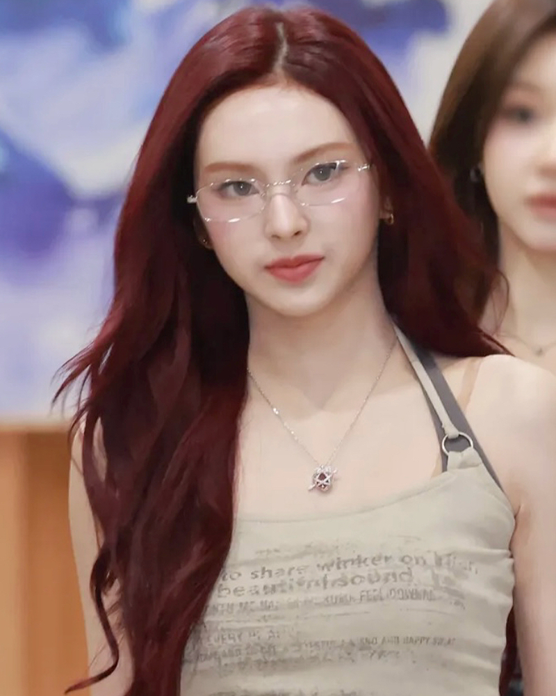 K-pop singer Chiquita wearing a ruby pendant necklace